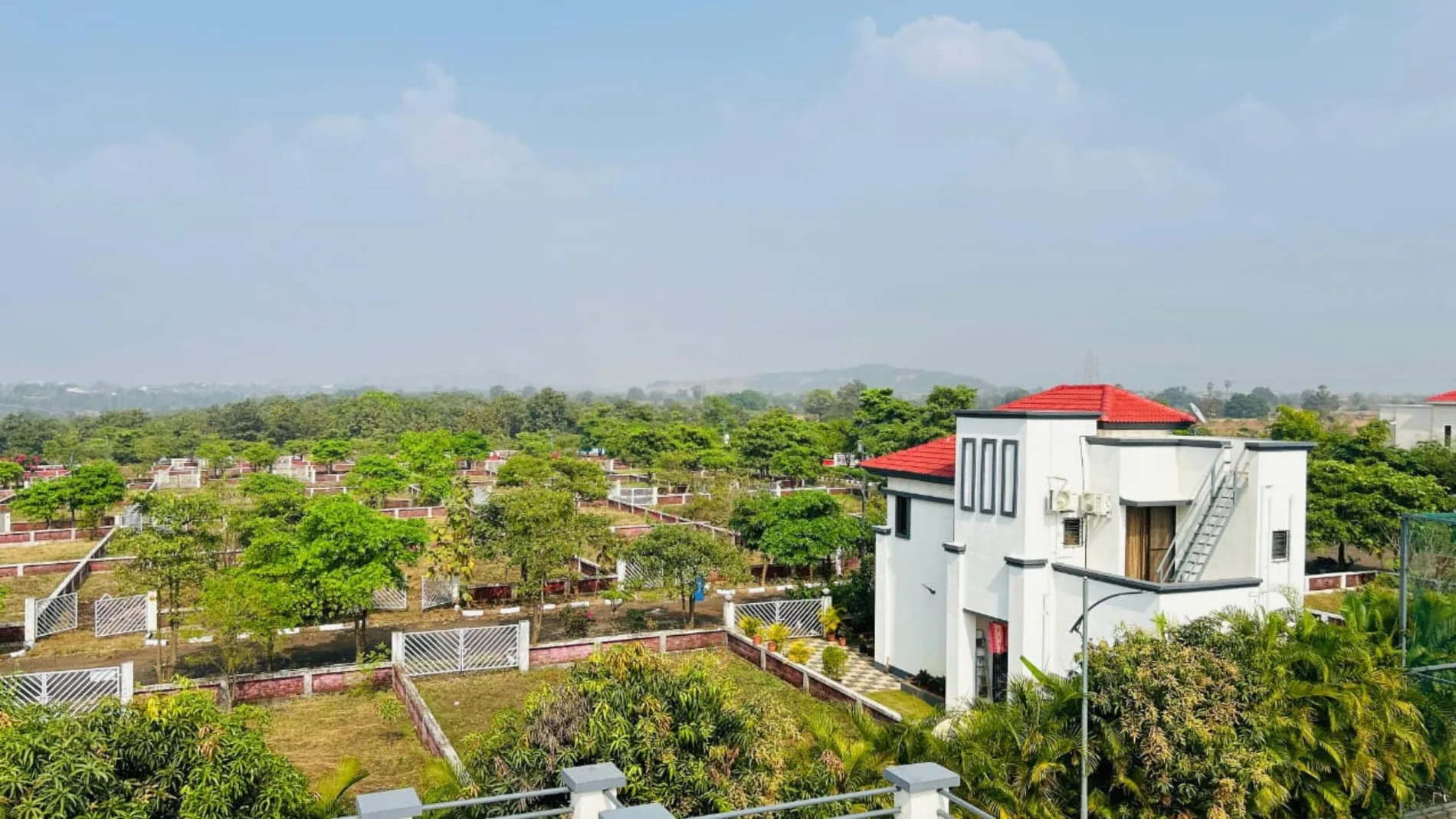 Atgaon township, Shahapur — a freehold, non-agricultural, sanctioned plotted development